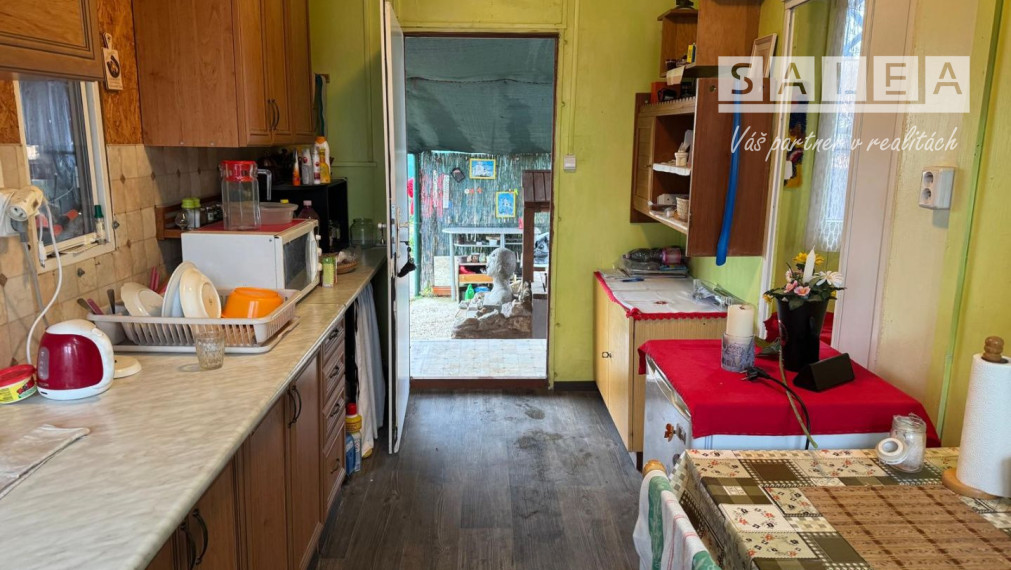 Výrazne znížená cena ...Krásna chalúpka v tesnej blízkosti rieky Váh v osobnom vlastníctve- Exkluzivne iba u nás