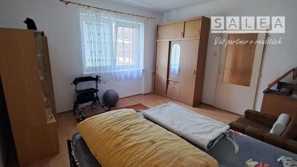 Bytová jednotka v rodinnom dome so  záhradou.