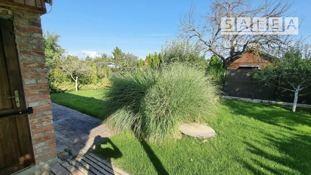 Krásna záhrada v Šali 305 m2 s chatkou pri futbalovom štadióne