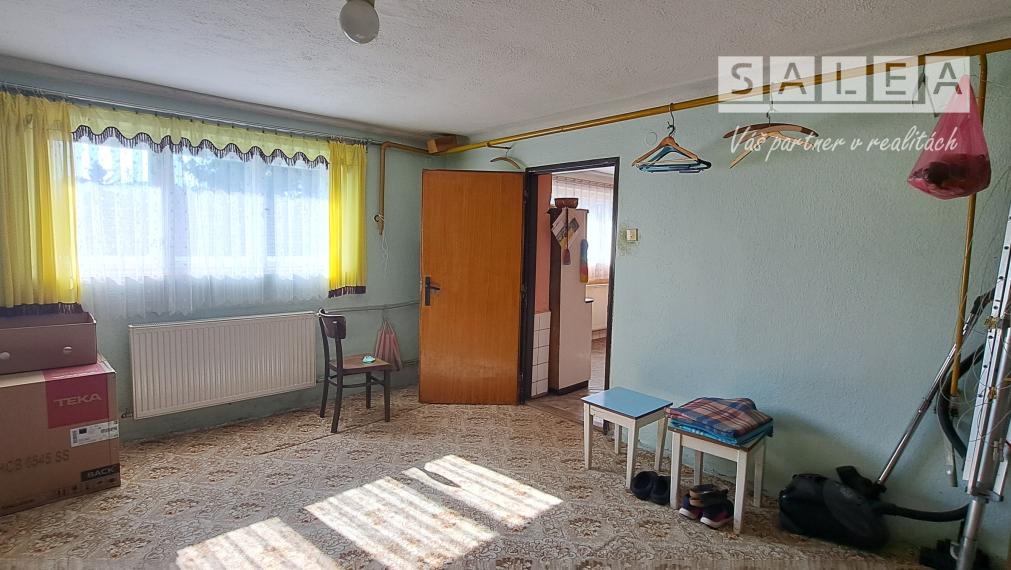 Rodinný dom v obci Lovča aj s garážou a záhradou