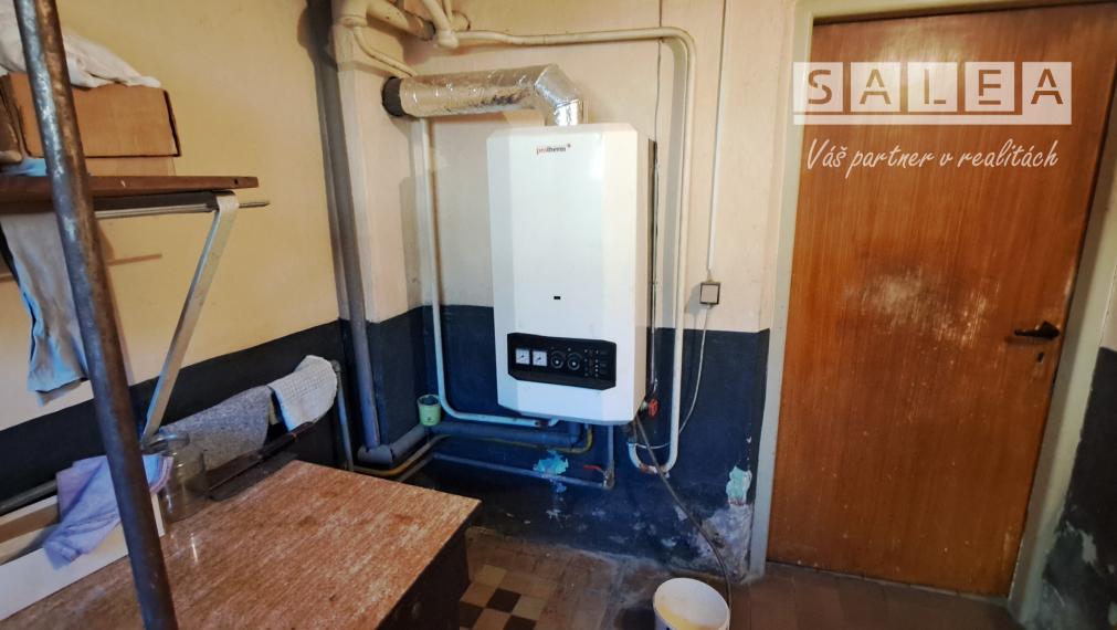 Rodinný dom v obci Lovča aj s garážou a záhradou