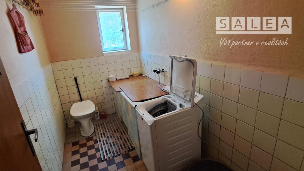 Rodinný dom v obci Lovča aj s garážou a záhradou