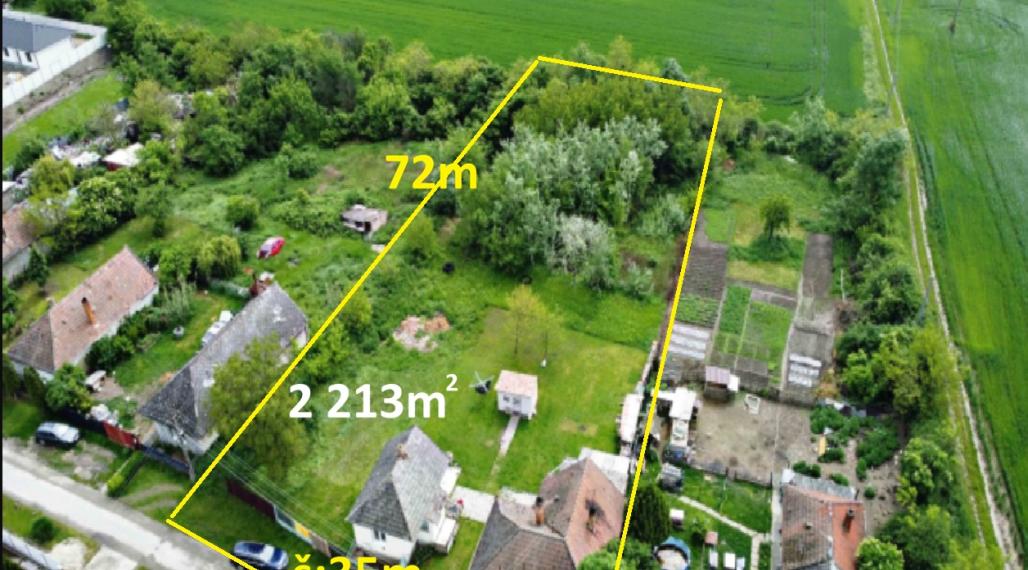 Stavebný pozemok 2213m2 s domom. Tomášikovo